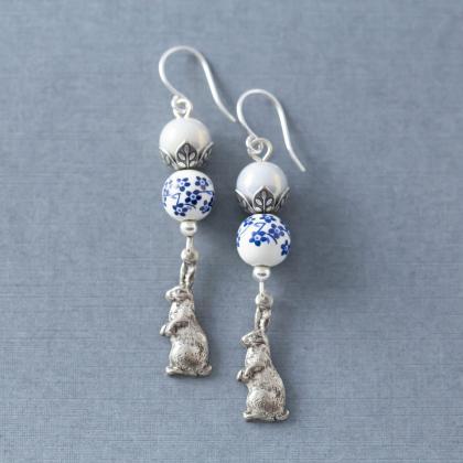 Silver Tone Rabbit Earrings With Blue And White..