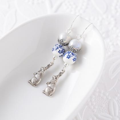Silver Tone Rabbit Earrings With Blue And White..